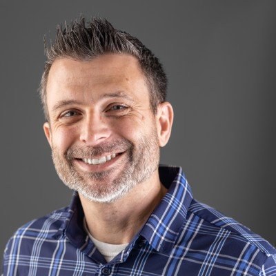 Headshot (Joe Clarke Headshot) — confirm name and role with owner